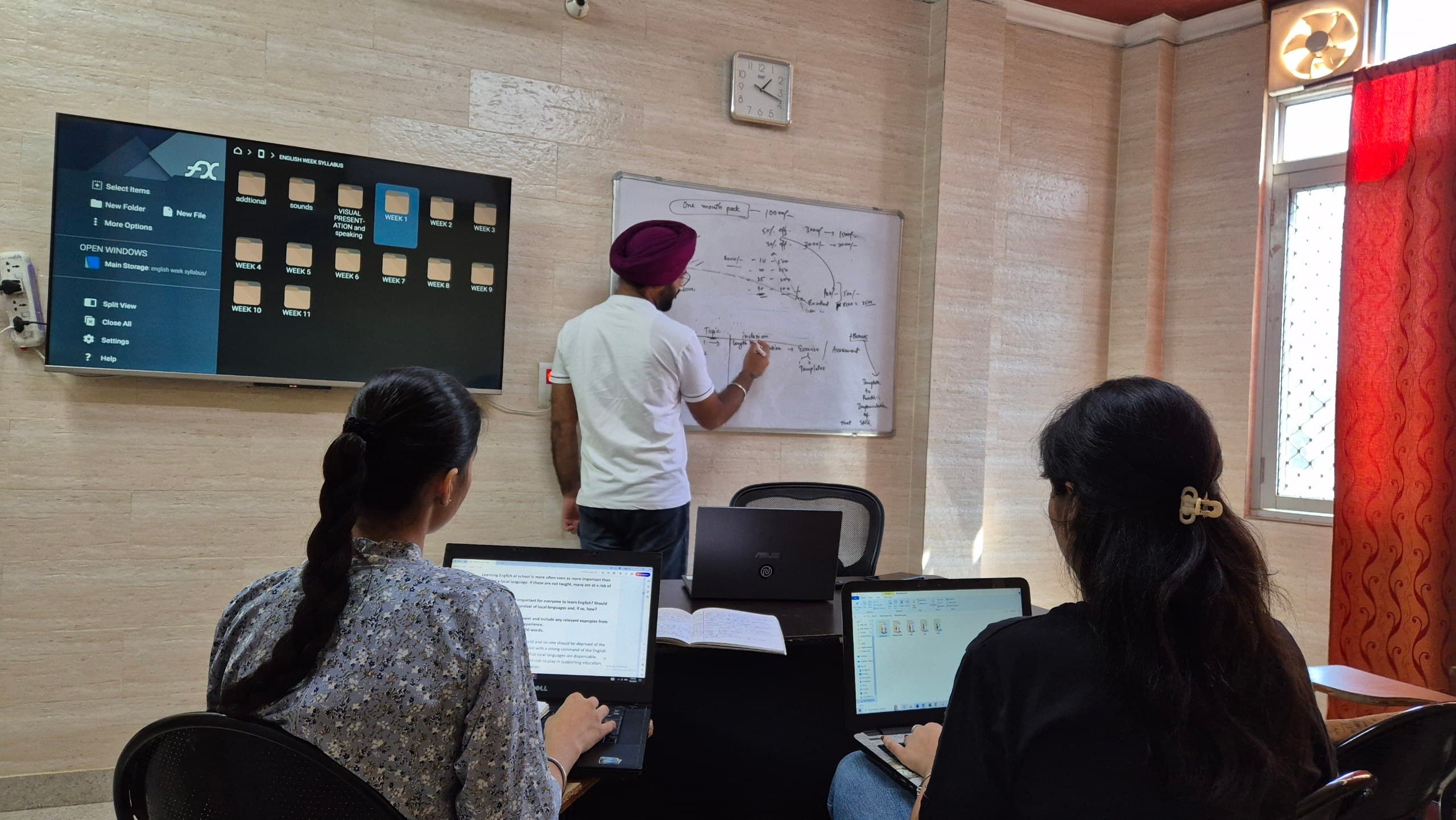 IELTS Writing Task 1 class in progress at Pioneer Education Center, Morinda